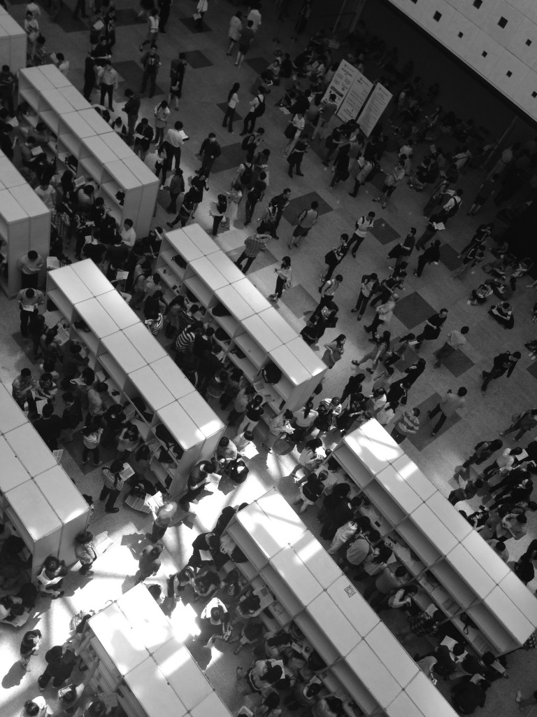 Anxious test takers cramming for last minute formal during lunch break.